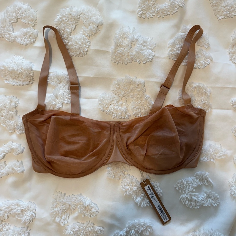 SKIMS NO SHOW UNLINED BALCONETTE BRA | OCHRE / 36DD.